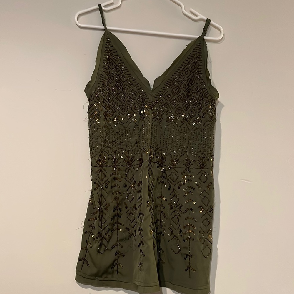 Free People greenish with gold and size xs